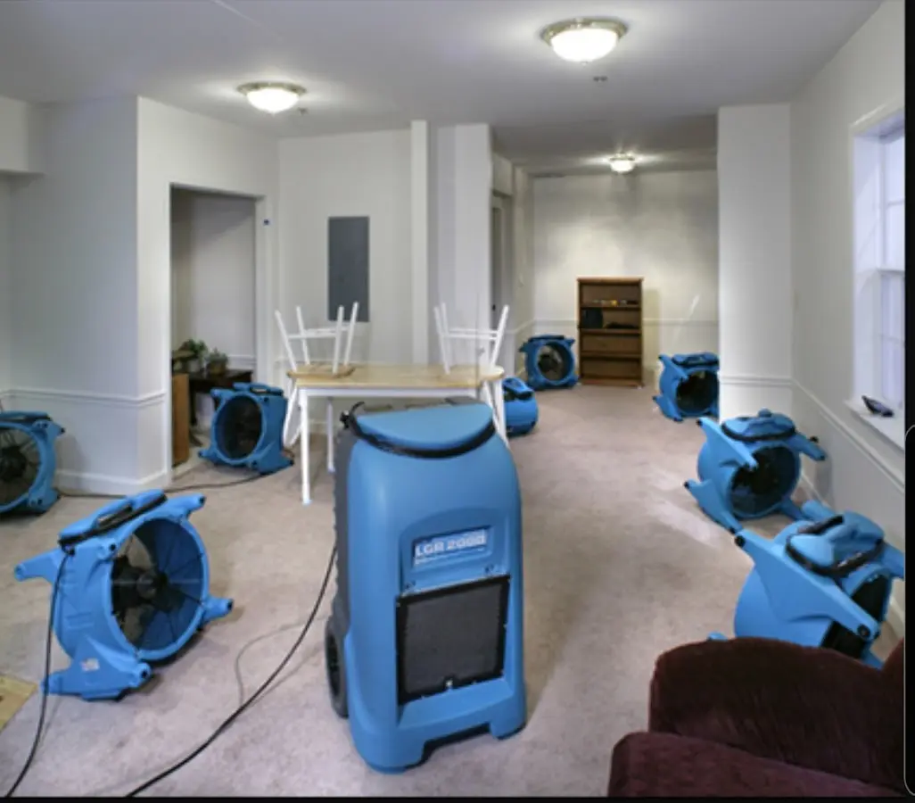 Air movers and dehumidifier setup for Water Damage Restoration in New Franklin